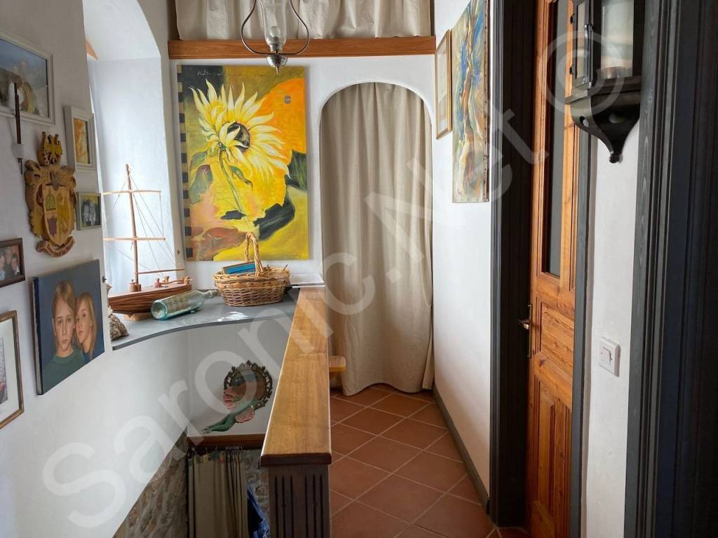 Storage at the end of landing opposite family shower room