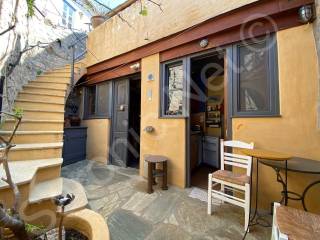 Built in washing machine under stairs, work room and bedsit