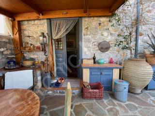 Dining terrace into mid-level open plan living space
