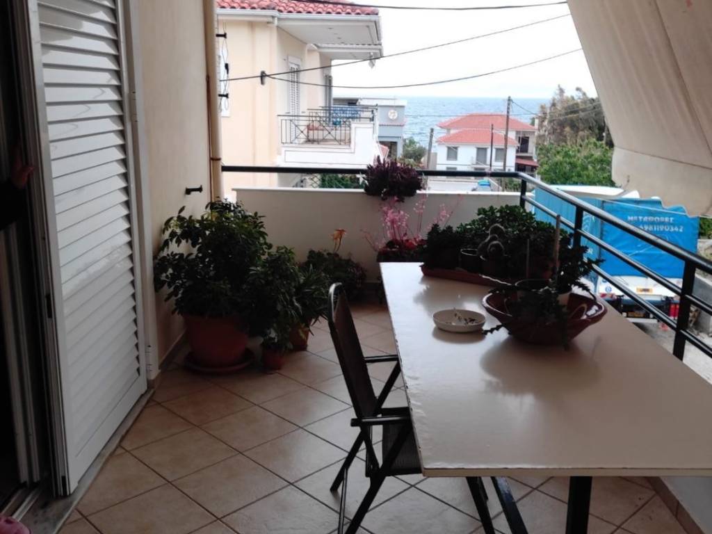 μπαλκόνι - τέντες Α ορόφου-θέα θάλασσα