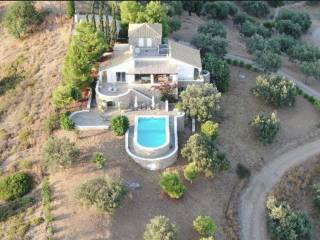 stone villa of unique aesthetics and multi-level architectur