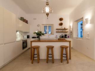 Overlooking the unique pebbly beach of Houlakia