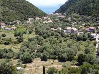 Aerial view of land for sale with surrounding area