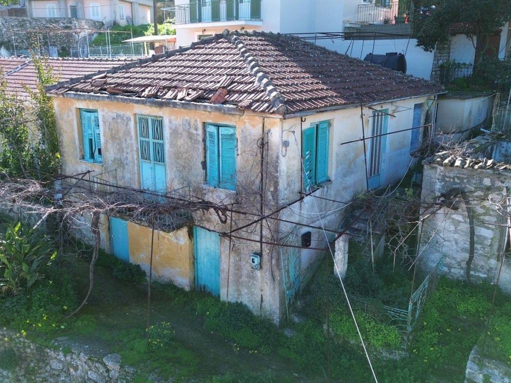 Aerial view of house with sea view for sale