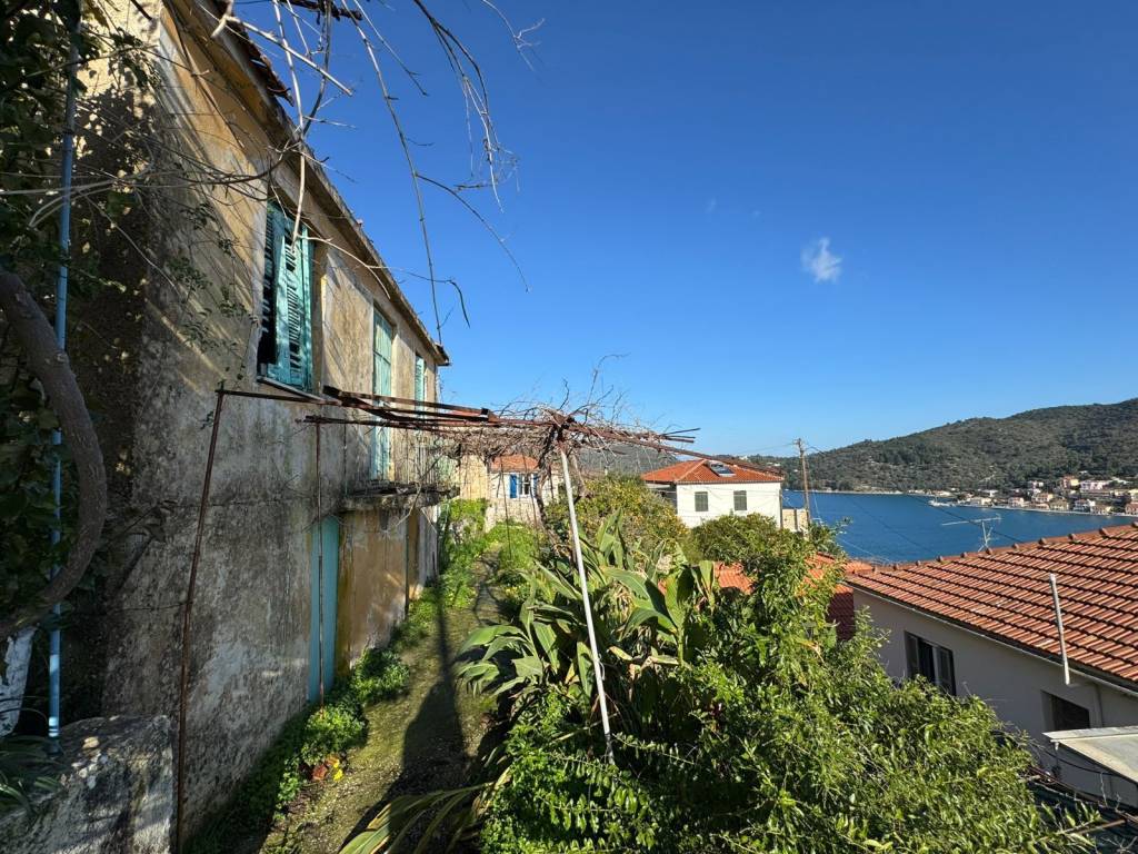 Outside areas of house with sea views for sale in Vathi