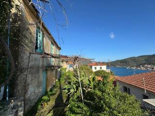Outside areas of house with sea views for sale in Vathi