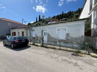 Road view of house for sale in Vathi Ithaca