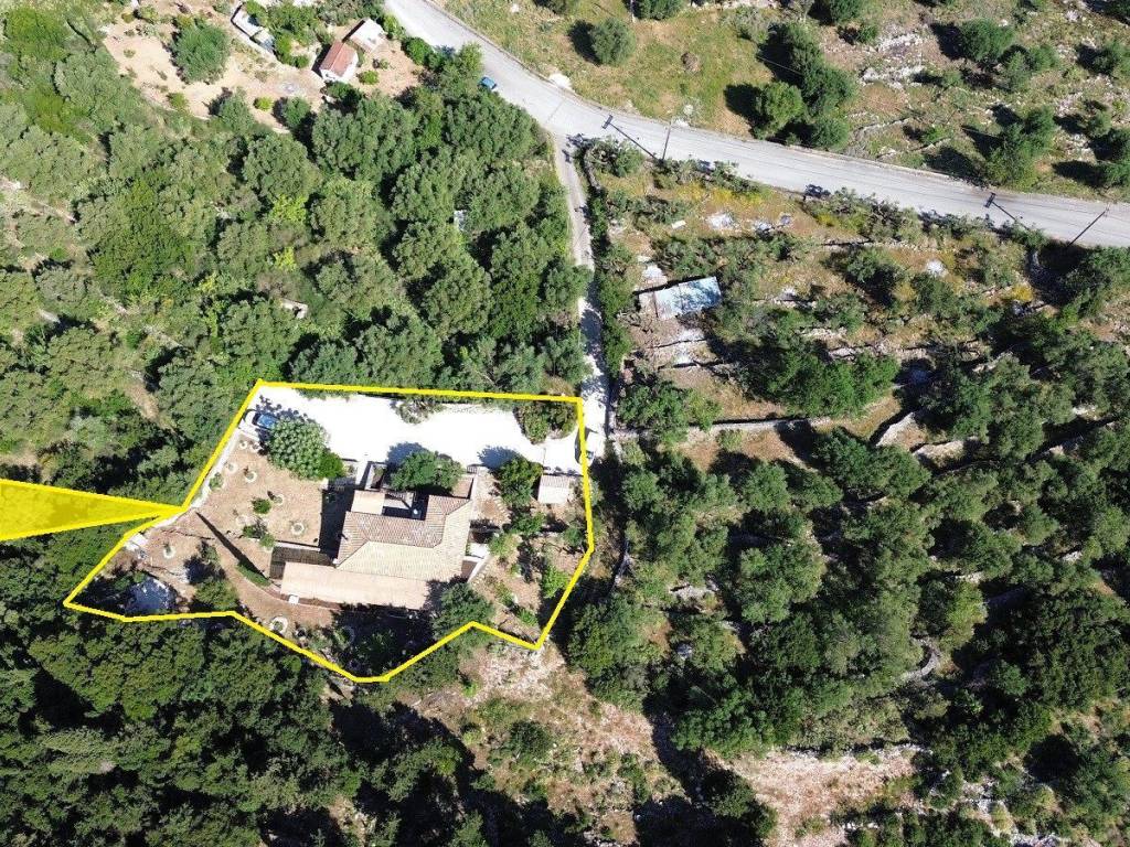 Aerial view with outlined border of the property