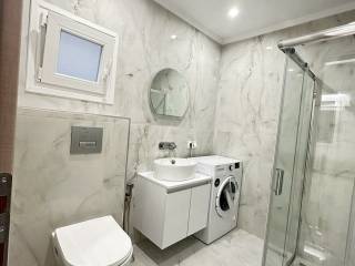 Forumland Real Estate, Μπάνιο