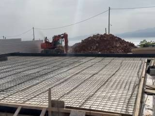 Construction rate from Mid May to Mid June. Model house.