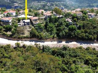 Aerial view and location of the house