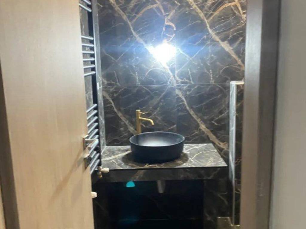 Forumland Real Estate, Μπάνιο