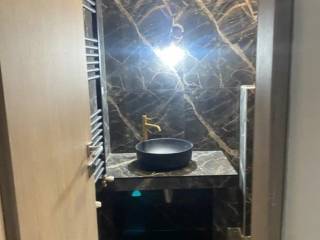 Forumland Real Estate, Μπάνιο