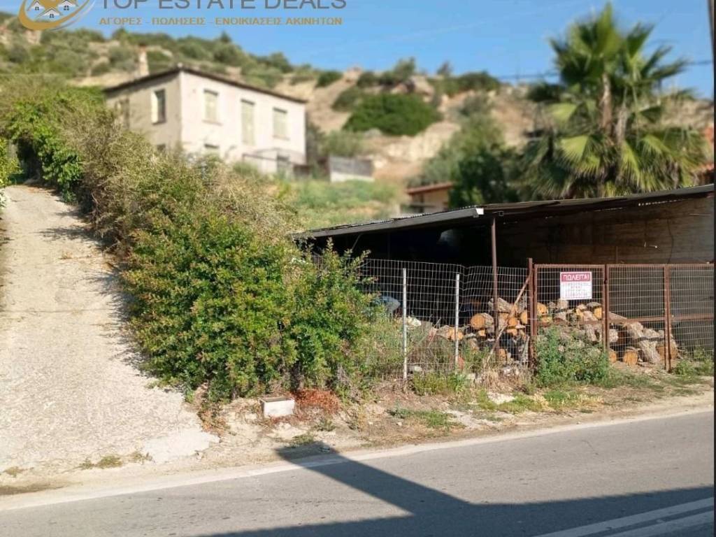 Gkaraz pano sten eparchiake odo  ,oikia sto bathos