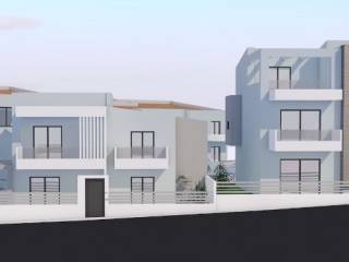 Εξωτερική όψη πολυτελών κατοικιών με μοντέρνα αρχιτεκτονική.