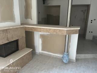 Forumland Real Estate, Σαλόνι με τζάκι