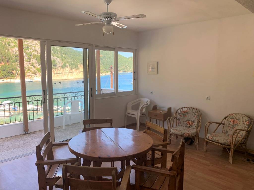 Living area and balcony with sea view