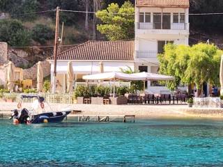 Apartment complex for sale seen from the sea