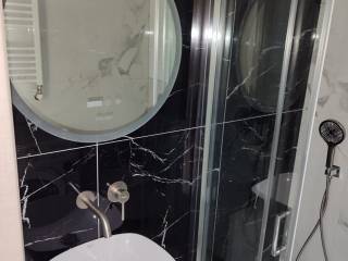 Forumland Real Estate, Μπάνιο