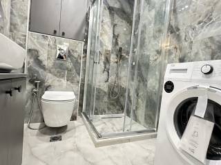 Forumland Real Estate, Μπάνιο