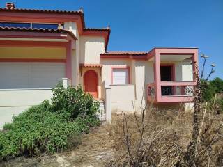 two-level farm house is for sale