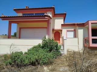 two-level farm house is for sale