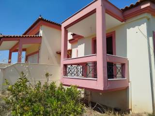 two-level farm house is for sale