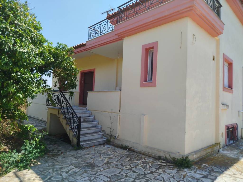 two-level farm house is for sale