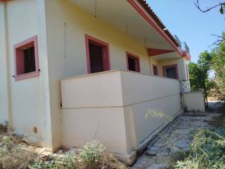 two-level farm house is for sale