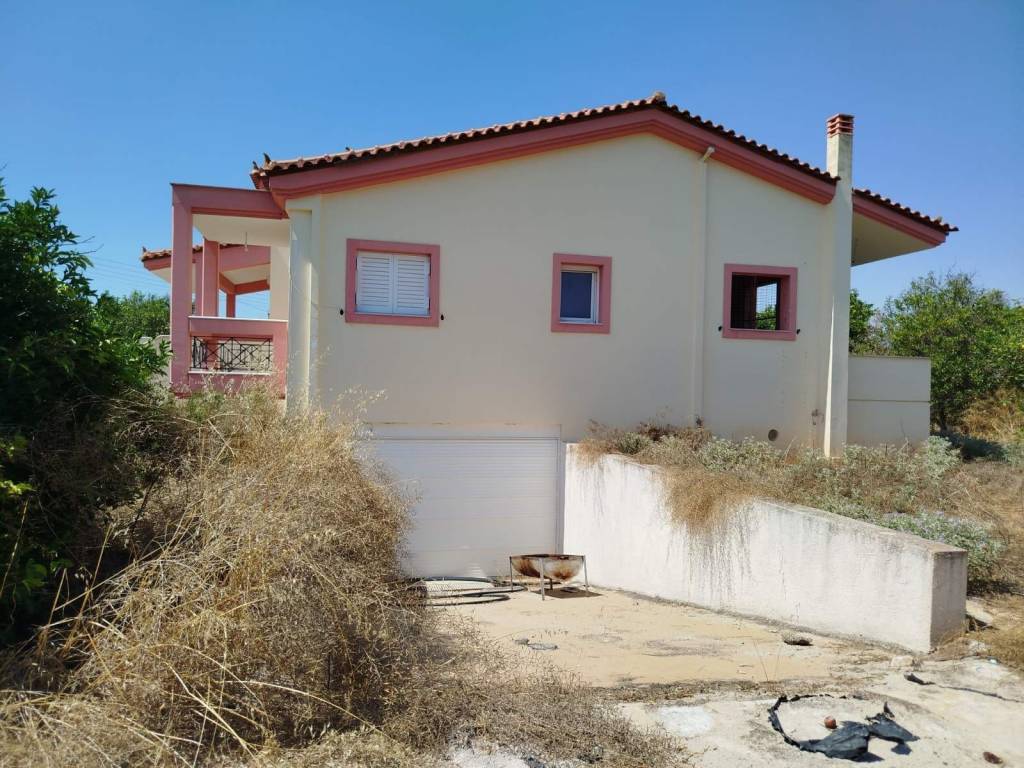 two-level farm house is for sale