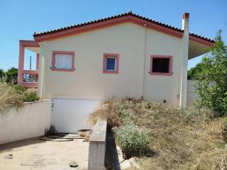 two-level farm house is for sale