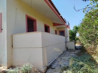 two-level farm house is for sale