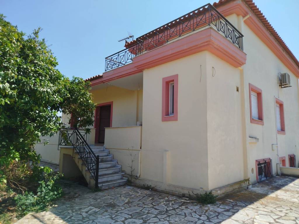 two-level farm house is for sale