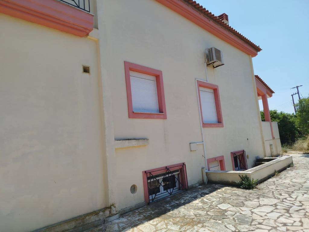 two-level farm house is for sale