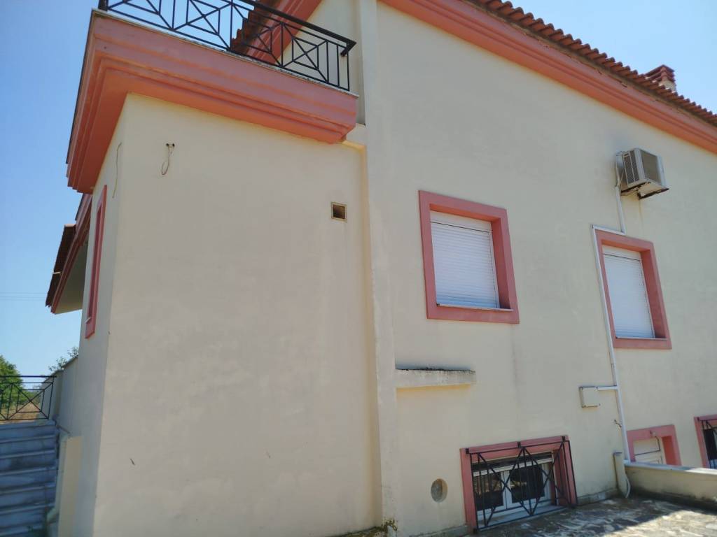 two-level farm house is for sale