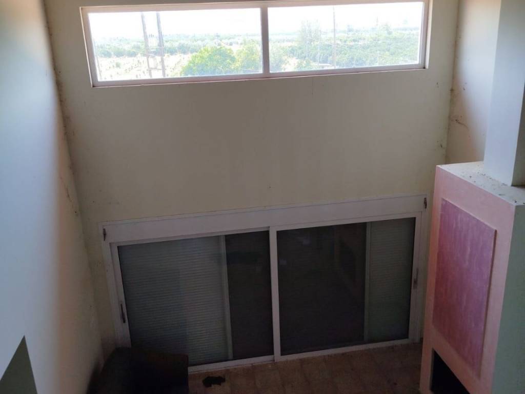 two-level farm house is for sale