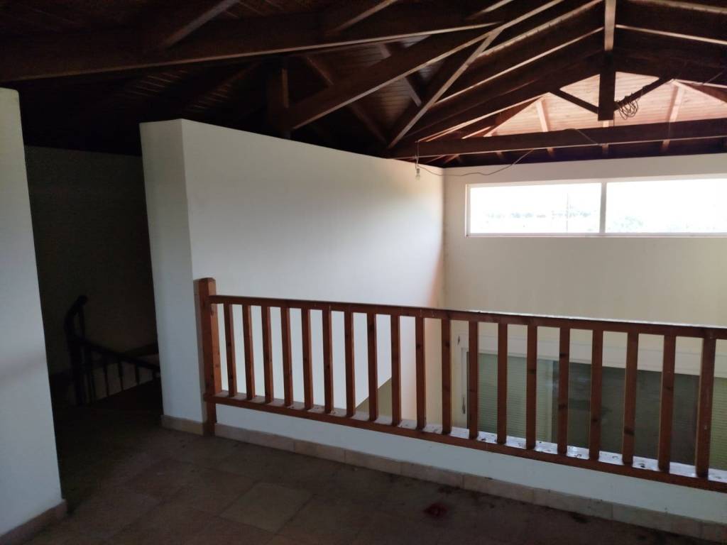 two-level farm house is for sale