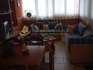 trapezaria saloni me megala parathyra gia ateleiote thea