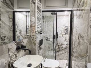 Forumland Real Estate, Μπάνιο