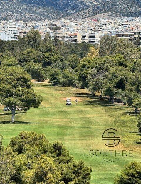 GOLF VIEW FROM THE LIVING ROOM
