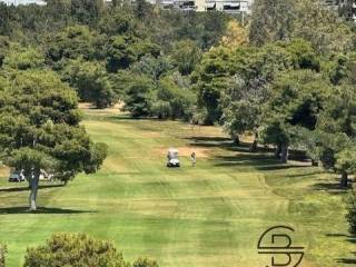 GOLF VIEW FROM THE LIVING ROOM