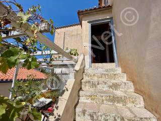 Entrance courtyard stairs to mid-level