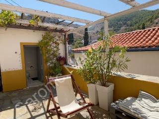 Courtyard shower room with hip bath &amp; shower over.
