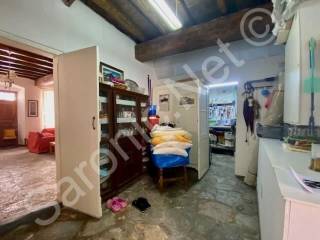 Ground floor utility room and storage from sitting room