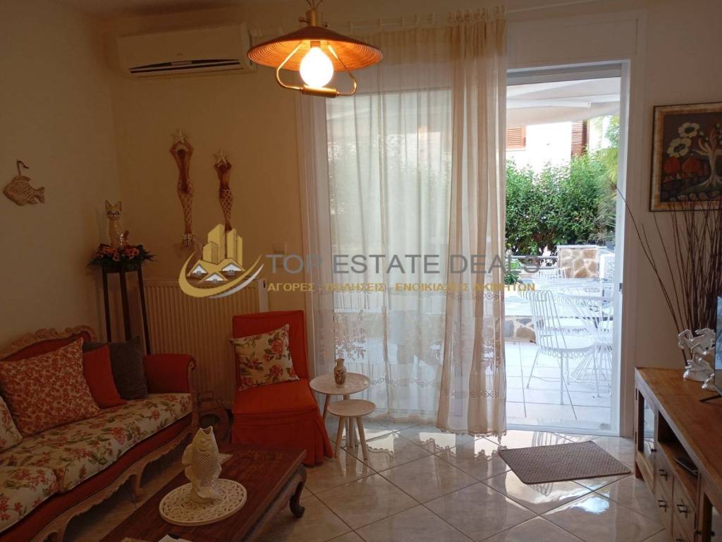 σαλόνι-καθιστικό κλιματιστικό -μπαλκονόπορτα 2η βεράντα