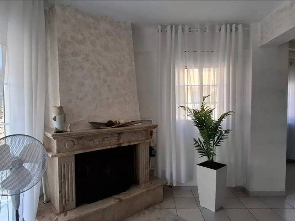 Forumland Real Estate, Σαλόνι με τζάκι