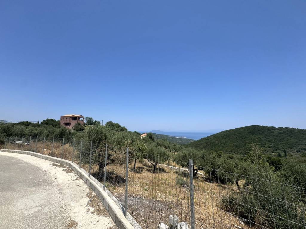 Road view of land with building license