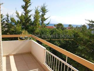 θέα θάλασσα από το μπαλκόνι