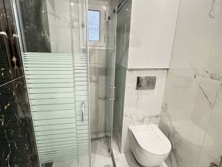 Forumland Real Estate, Μπάνιο