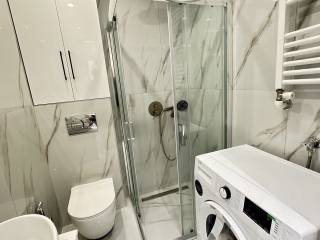 Forumland Real Estate, Μπάνιο με ντουζιέρα